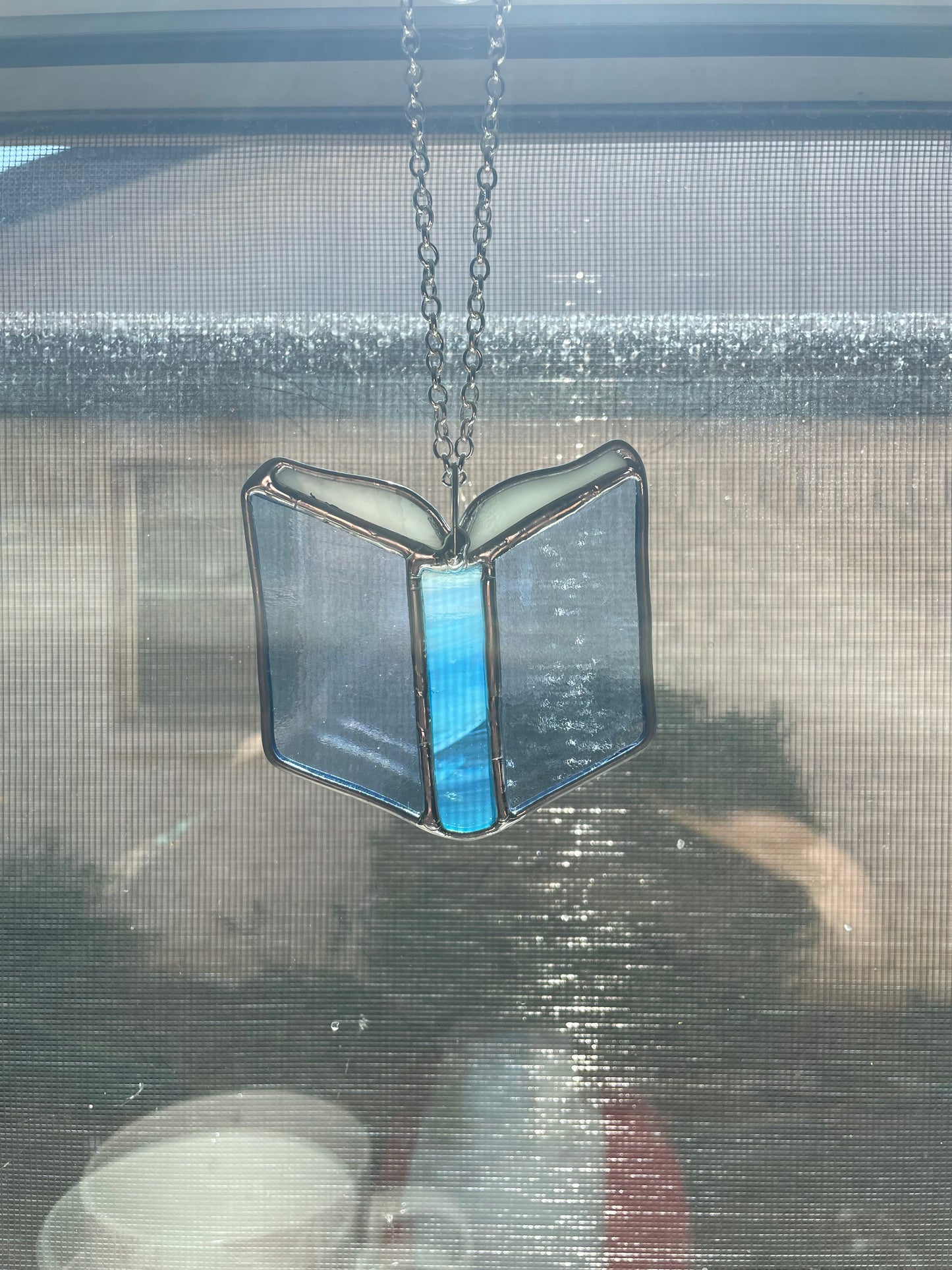 Clear blue book car charm