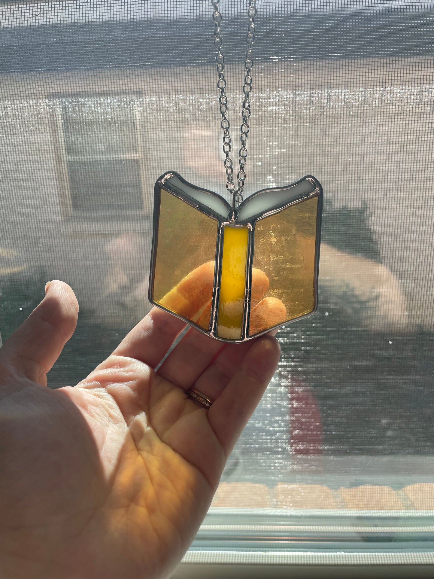 Yellow book car charm