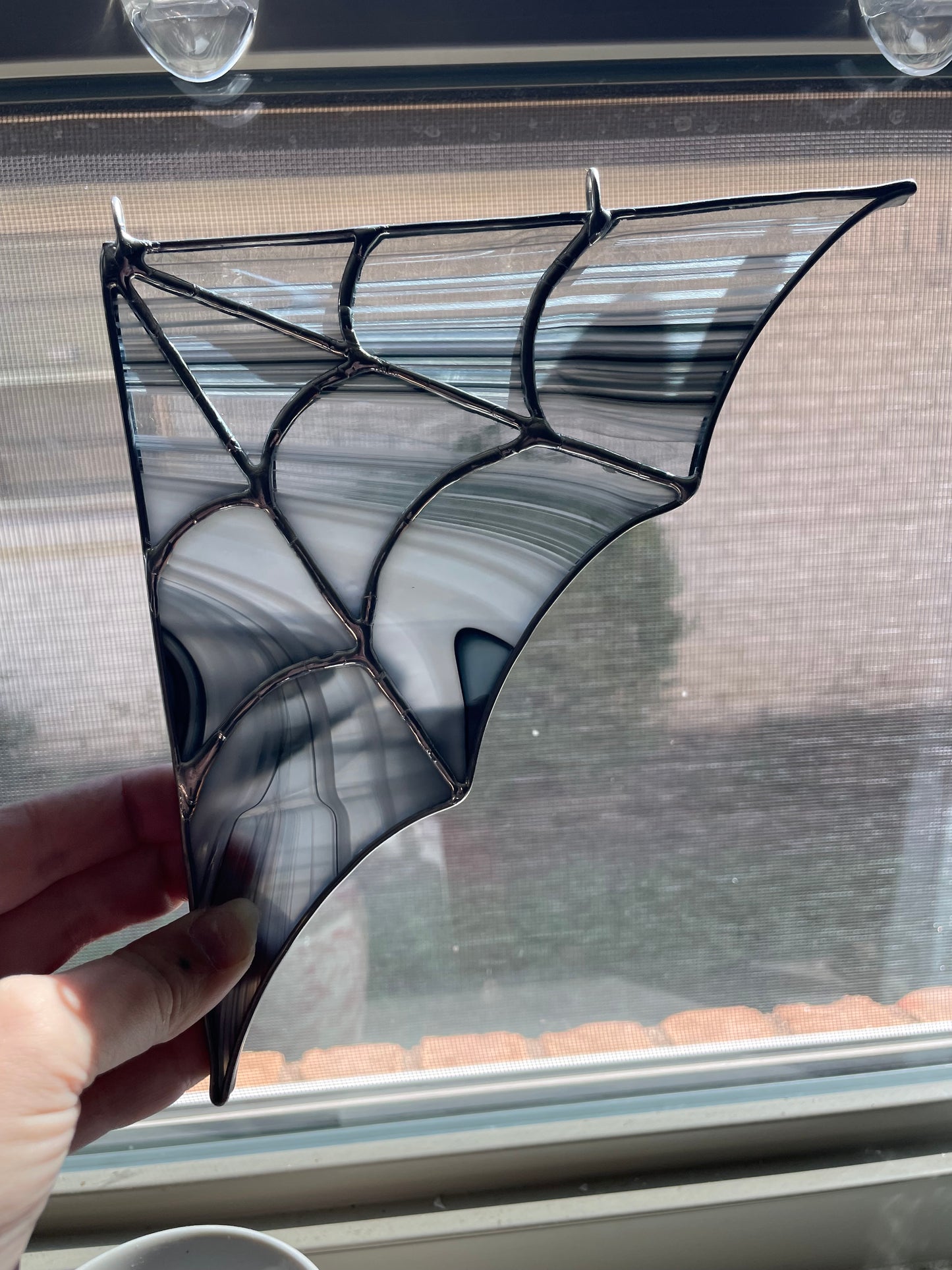 Silver and black spiderweb corner