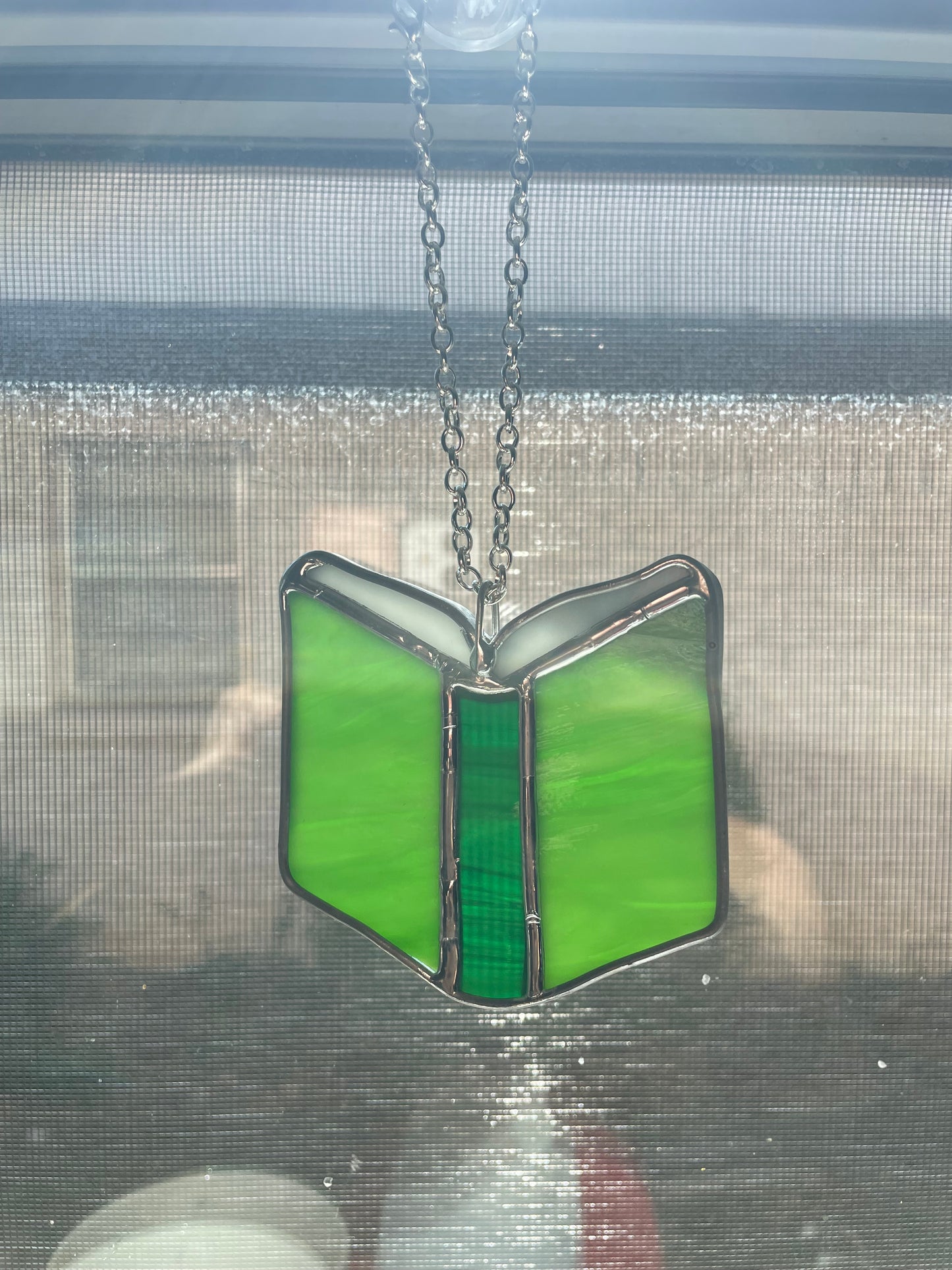 Light green book car charm
