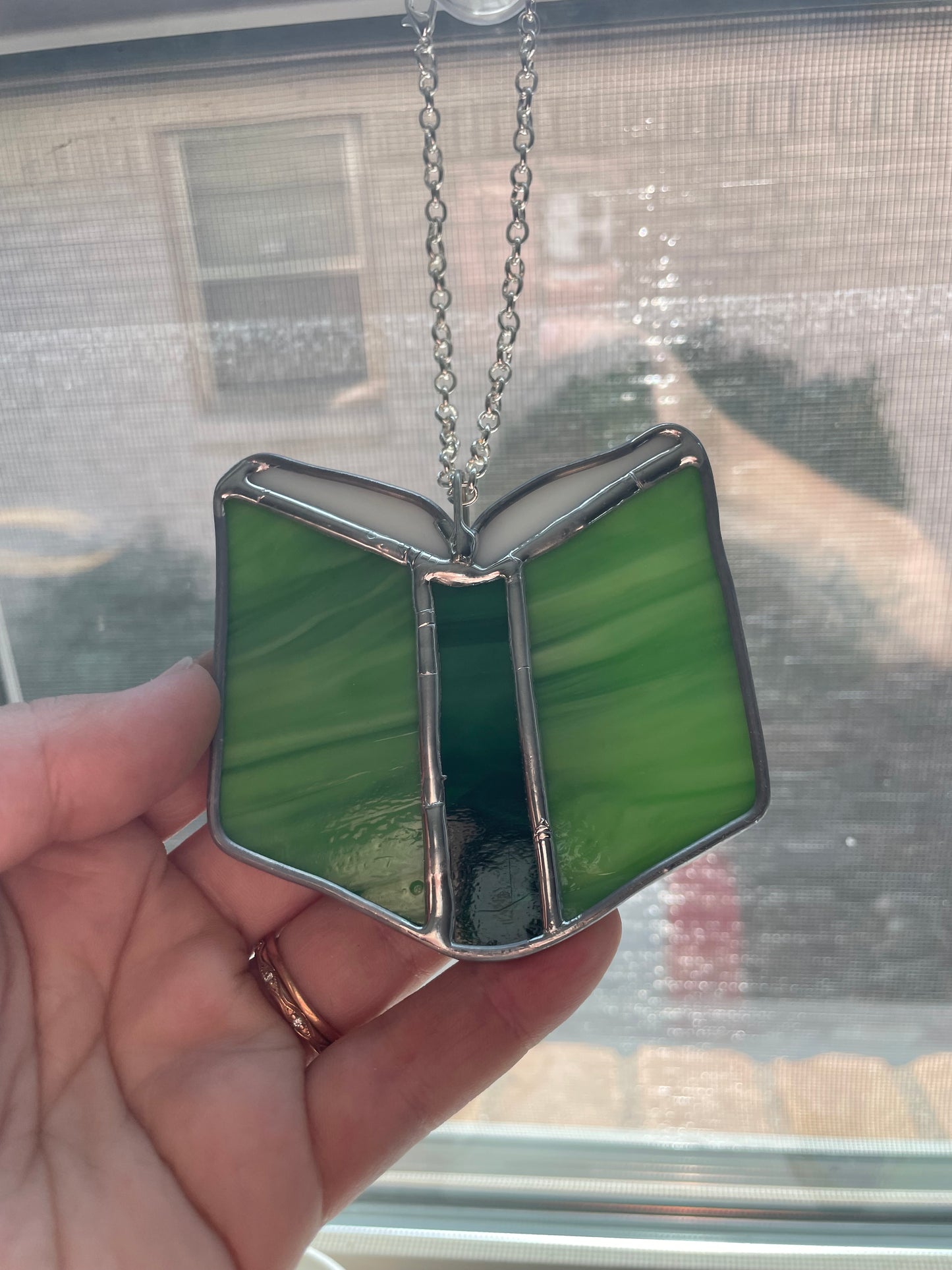 Light green book car charm