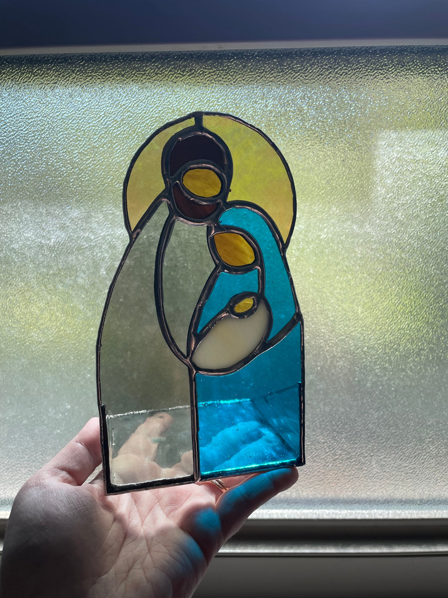 Holy family candle holder