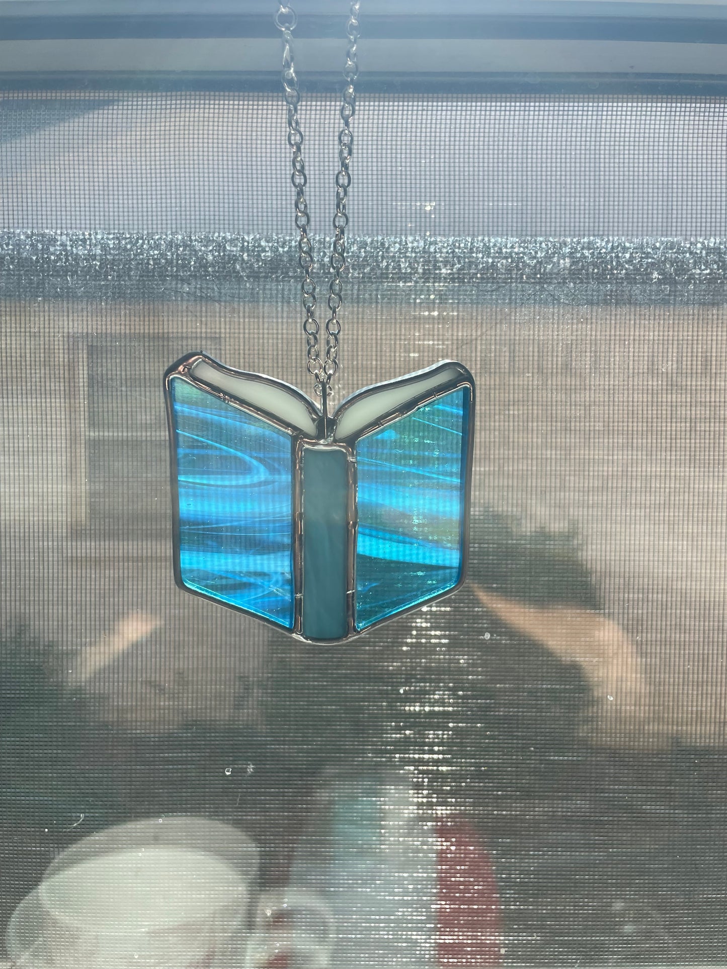 Swirled blue book car charm