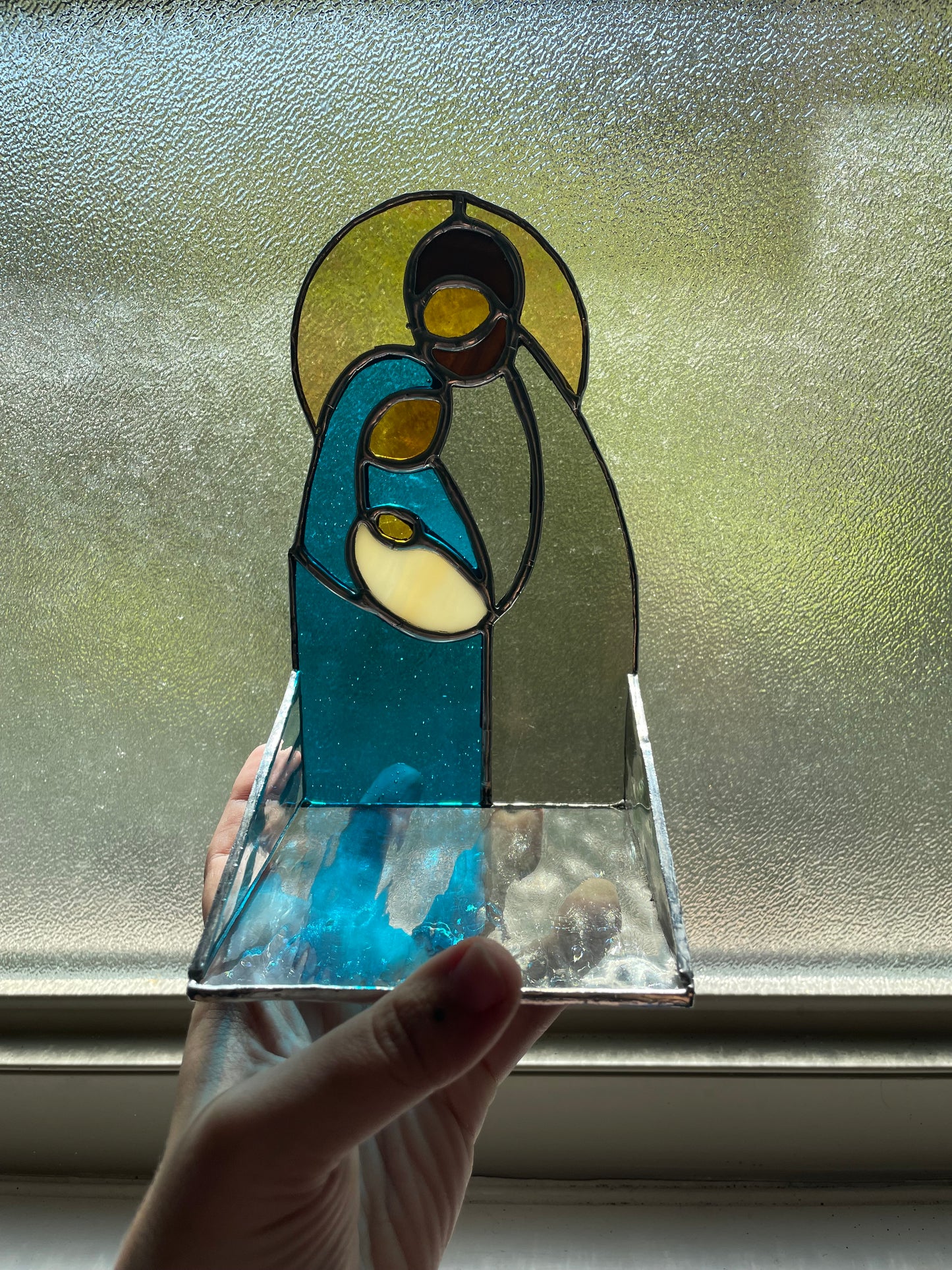 Holy family candle holder