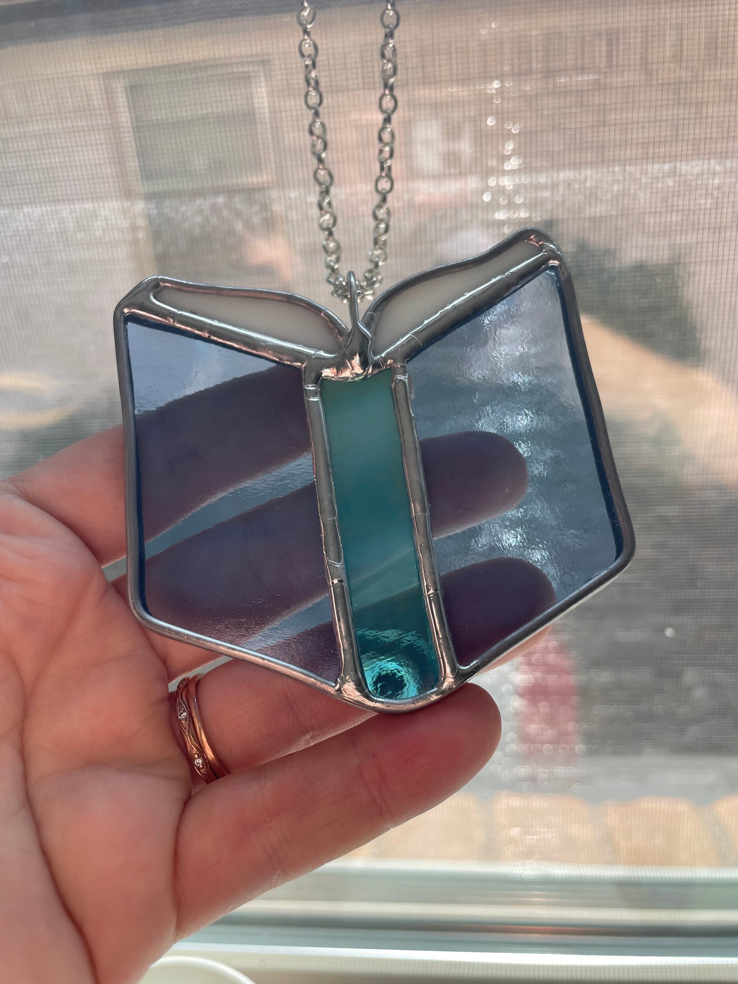 Clear blue book car charm